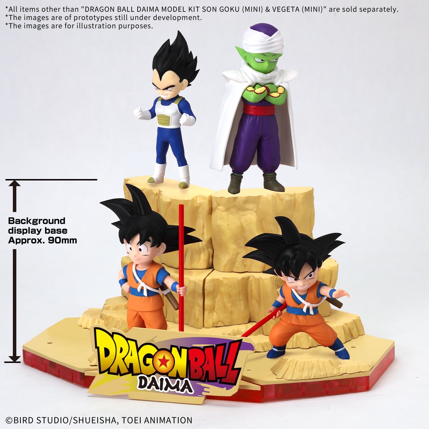 Dragon Ball Z model kit with Son Goku and Piccolo figures on a display base.