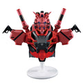 Red and black robot figurine on a white background