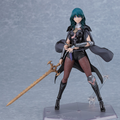 Action figure with green hair and a sword on a gray background