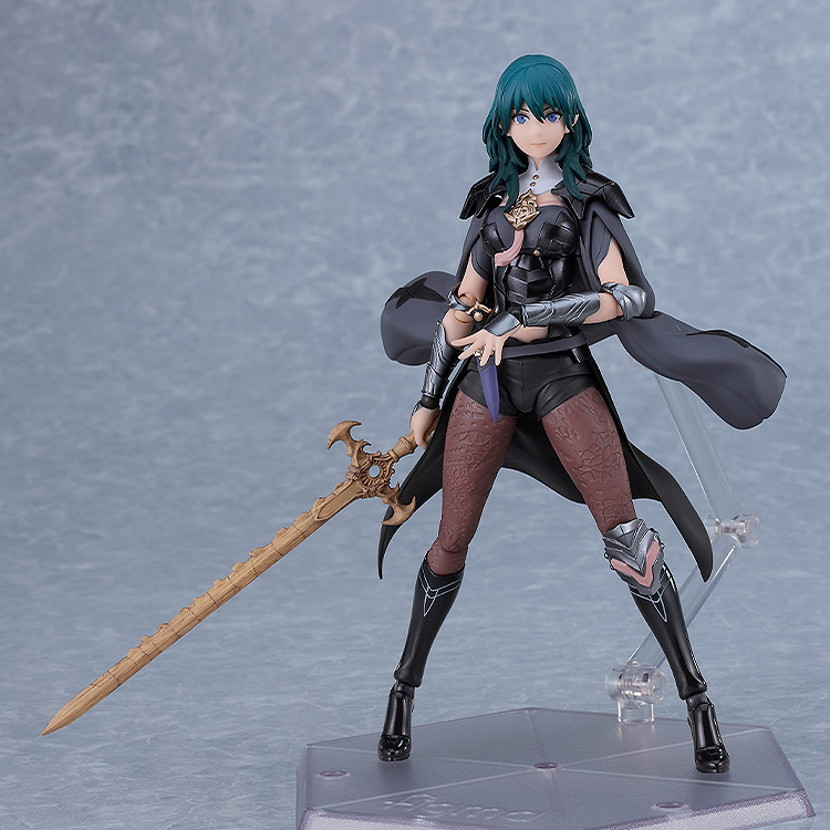 Action figure with green hair and a sword on a gray background