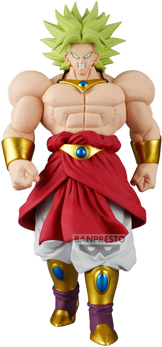 Action figure with green hair and red outfit on a white background