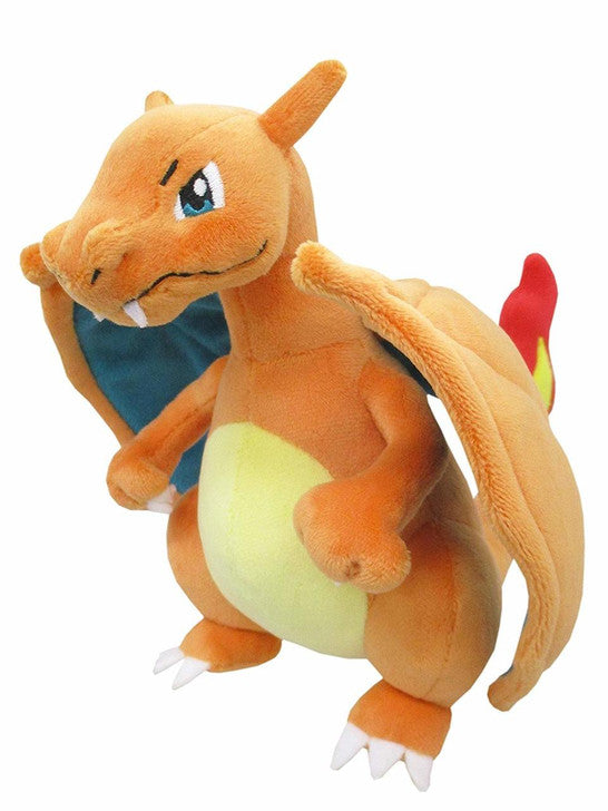 Plush toy of a dragon-like creature with orange body, blue chest, and red tail on a white background
