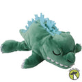 A green plush dinosaur toy with a sleeping face, white teeth, and light blue spikes along its back, shown on a plain white background with a small 'We-R-Toys' logo in the bottom right corner.