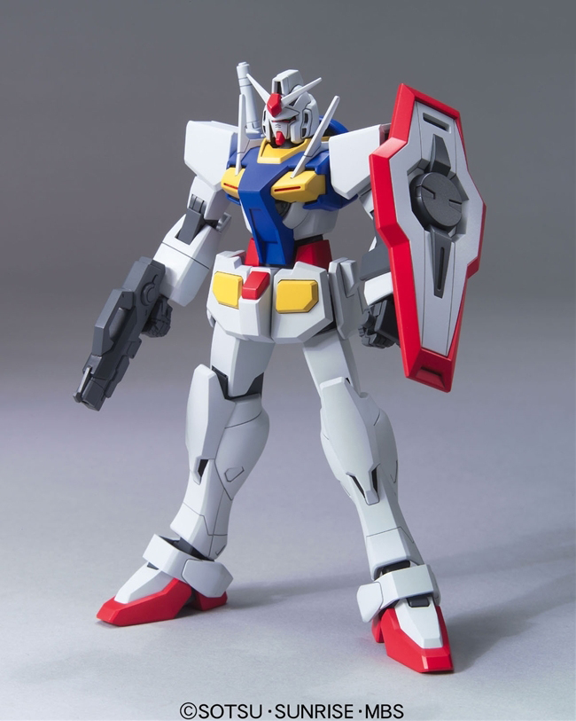 Model kit of a robot with red, white, and gray color scheme on a gray background