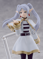 Figurine of a character with white hair and purple eyes, wearing a white and gold outfit.