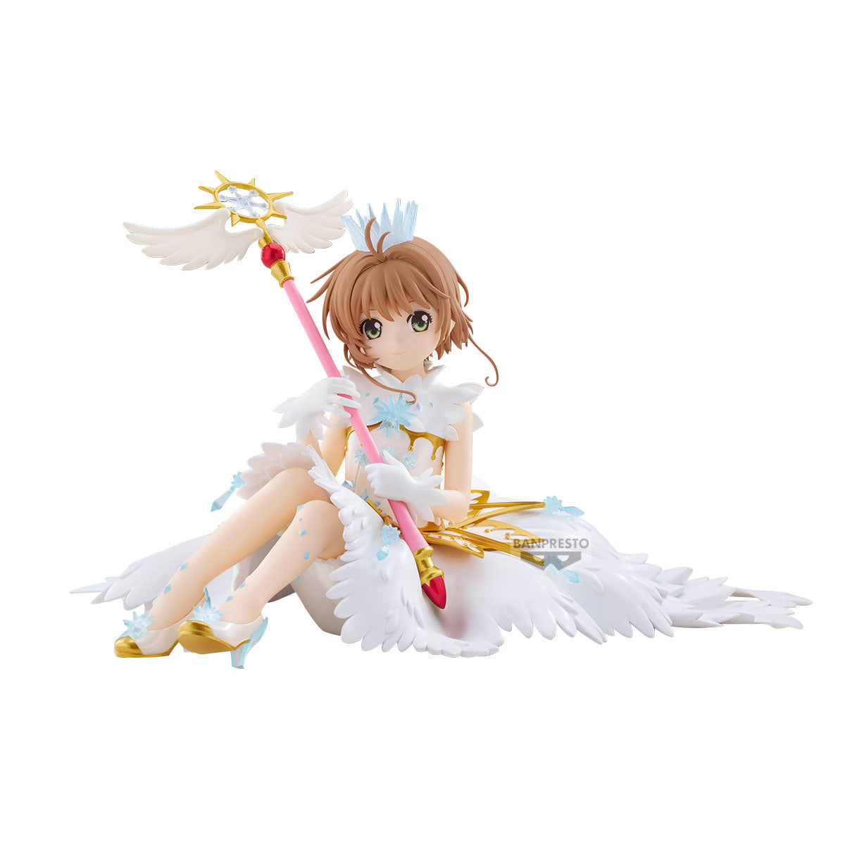 Anime character figurine with wings and a staff on a white background