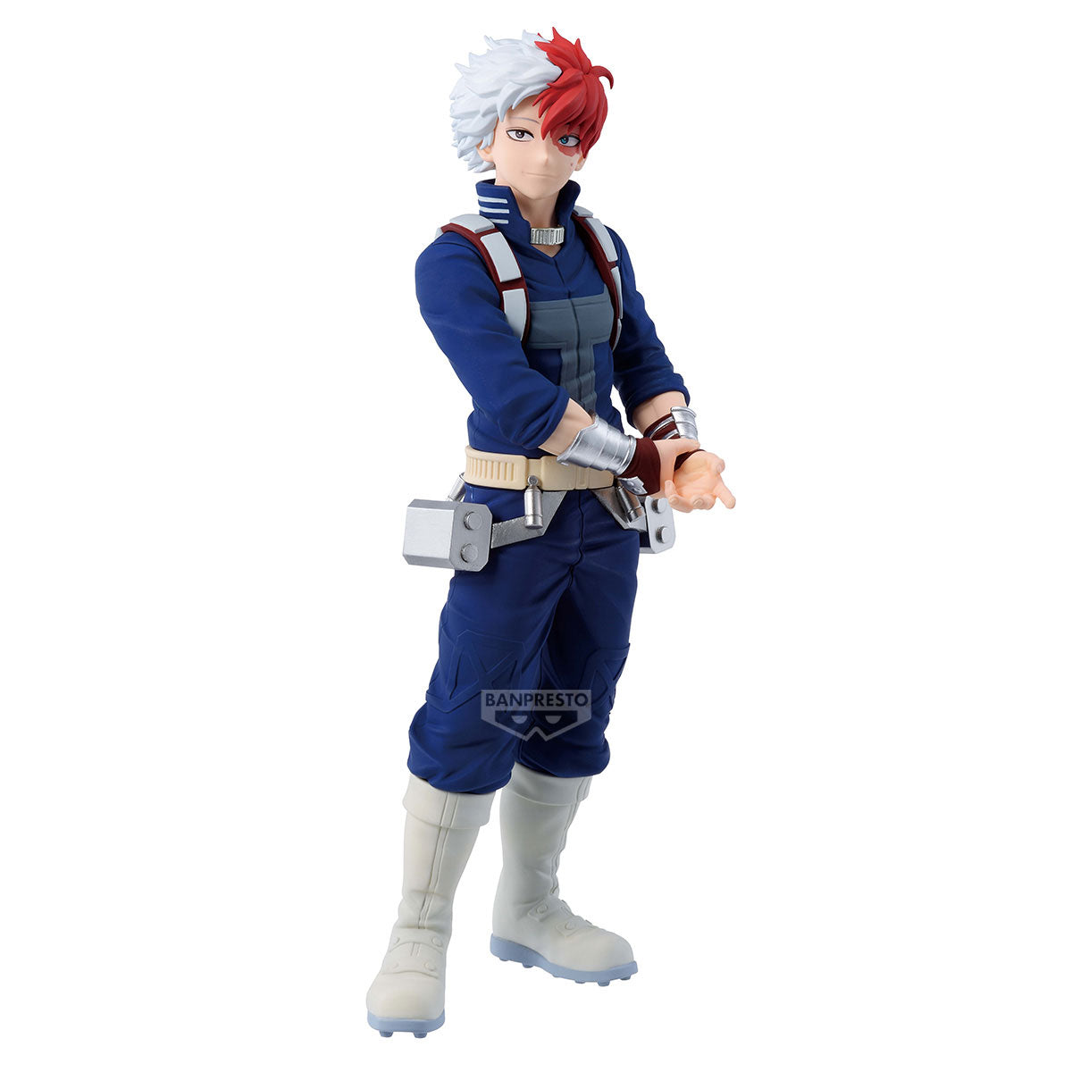 Action figure with blue outfit and red hair on a white background