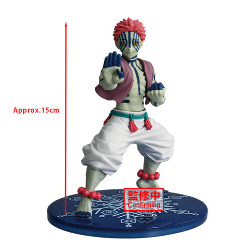 Colorful figurine on a blue base with measurement text