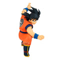 Action figure in orange and blue outfit with black hair on a white background