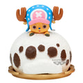 Toy figure of a character with a blue hat and brown spots on a white background