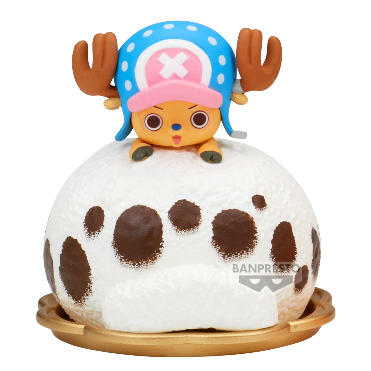 Toy figure of a character with a blue hat and brown spots on a white background