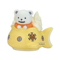 Toy figure of a bear in a yellow submarine with a visible brand logo on a white background