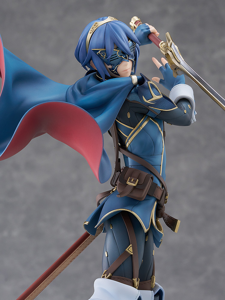 Figurine of a character in blue armor with a spear, on a gray background