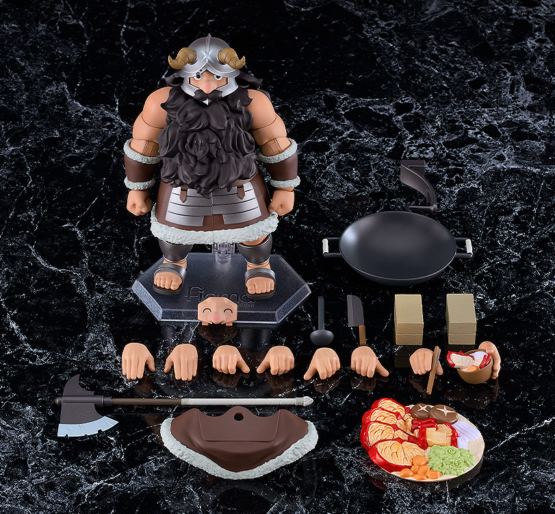 Action figure of a warrior with accessories on a dark marble surface