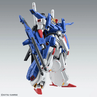 Model kit of a blue, white, and red robot on a gray background