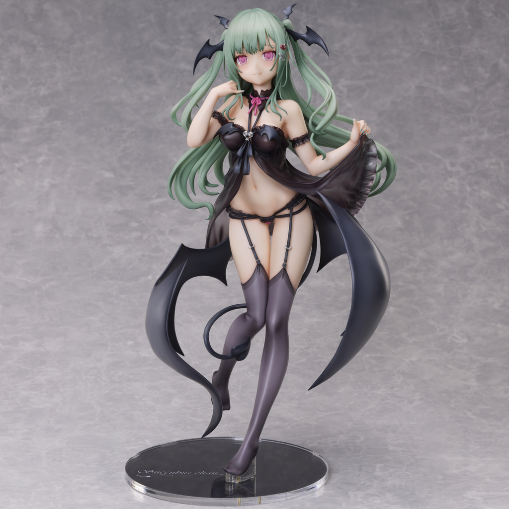 Anime figurine with green hair and black outfit on a gray background