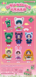 Set of small character figurines with colorful outfits on a pink background