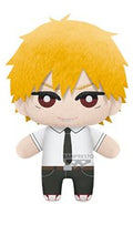 Small plush of a blonde haired boy in a black and white suit outfit smiling