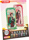 Puremind Demon Slayer Spring Matsuri Rotatable Stand packaging, featuring anime character stands with green and pink themed designs on a checkered card backing.