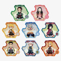 Eight anime character acrylic magnet from Demon Slayer, arranged in a 3x3 grid on a plain white background. Each standee has a colorful, patterned border and features a chibi-style character from the series.