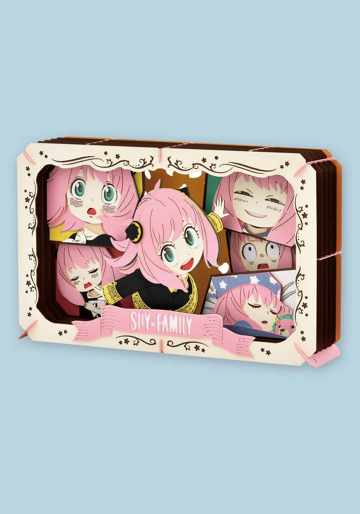 Cartoon character figurine set in a decorative box on a light blue background