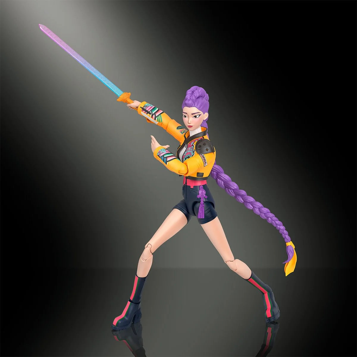 Action figure with purple hair and colorful outfit holding a sword on a dark background