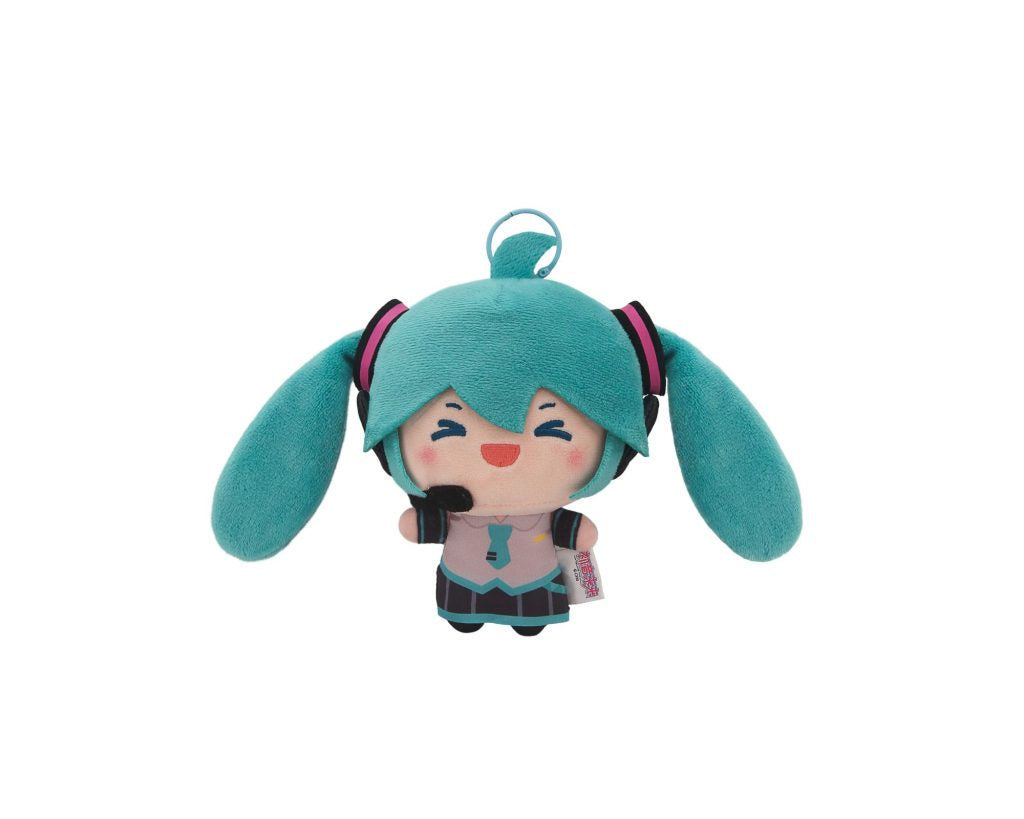 A plush toy of Hatsune Miku with turquoise twin-tails, a pink and gray outfit, and a small keychain ring at the top, shown against a plain white background.