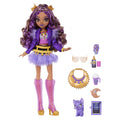 Doll with purple hair and outfit, surrounded by accessories on a white background