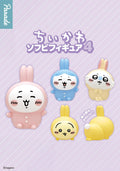 Set of five cartoon rabbit figurines with different colors and expressions on a light purple background.