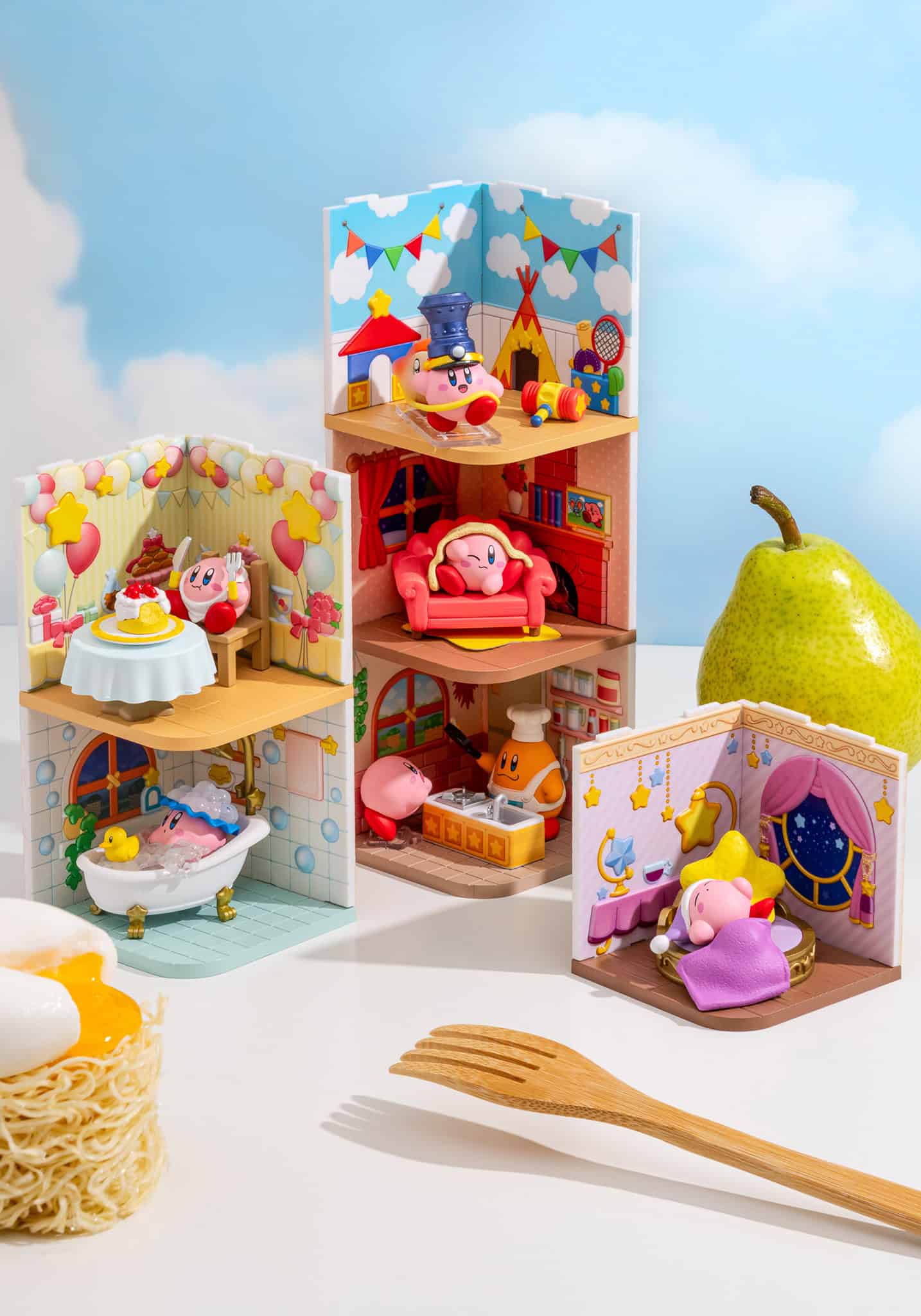 Toy playset with various rooms and figures on a light blue background