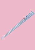Decorative ruler with cartoon designs on a pink background