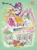 Promotional graphic for a pack of Toei Animation 'Magic Cure Optical Illusion' collectible trading cards, featuring anime characters from the Toonyou Girls franchise on a light green sparkly background, with several packs displayed at the bottom.