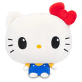 Plush toy resembling a character with a red bow, white face, black eyes, yellow nose, blue dress with white polka dots, and white paws on a white background.