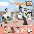 Set of animal figurines with a scenic background