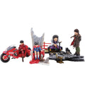 A multi-figure collectible set featuring characters from Akira on a white background. The set includes a red motorcycle with a figure in a red jacket, a gray throne with a child figure in a blue outfit, a purple-lavender carriage with an elderly woman figure, and a dark rocky platform with a standing figure in a brown coat.