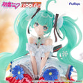 Figurine of a character with green hair and floral dress, featuring Crypton Future Media and PiaPro logos.