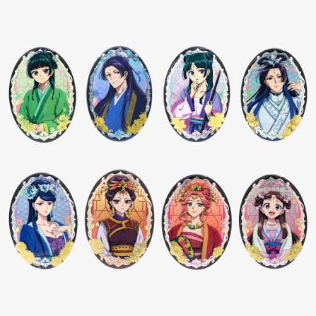 Eight oval anime-style character charms or stickers arranged in two rows on a light gray background. Each charm features a different illustrated female character in traditional-inspired clothing with colorful backgrounds and black borders.