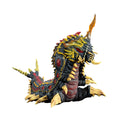 Colorful dragon figurine with red eyes and gold accents on a white background