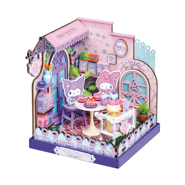 A Sanrio-themed 3D cardboard puzzle building kit featuring Kuromi and My Melody cafe interiors, shown fully assembled on a white background.