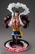 Action figure of a character from a popular anime on a gray background