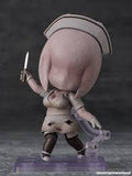 Figurine of a character with a nurse outfit holding a knife on a dark background