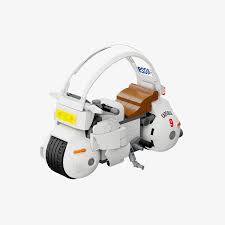 Toy motorcycle model with a white color scheme on a white background