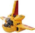 A yellow and red toy airplane built from interlocking blocks, featuring a clear cockpit dome, black interior details, and the number 115 on the side, isolated on a white background.