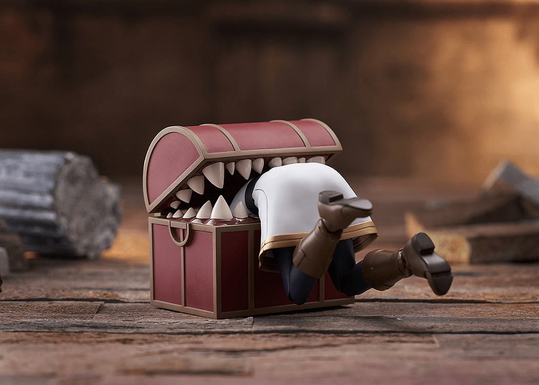 Frieren being eaten by a Mimic with her feet kicking.