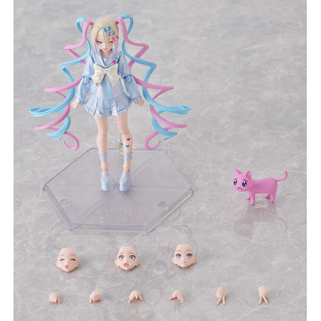 A figma of OMGkawaiiAngel from NEEDY STREAMER OVERLOAD, featuring multiple face plates and optional parts for various poses, including a :( Cat accessory.