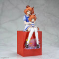 Anime figurine on a red box with a gray background