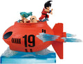 Toy figure of a red submarine with characters on top, on a white background