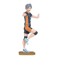 Figurine of an animated character in a sports uniform on a white background