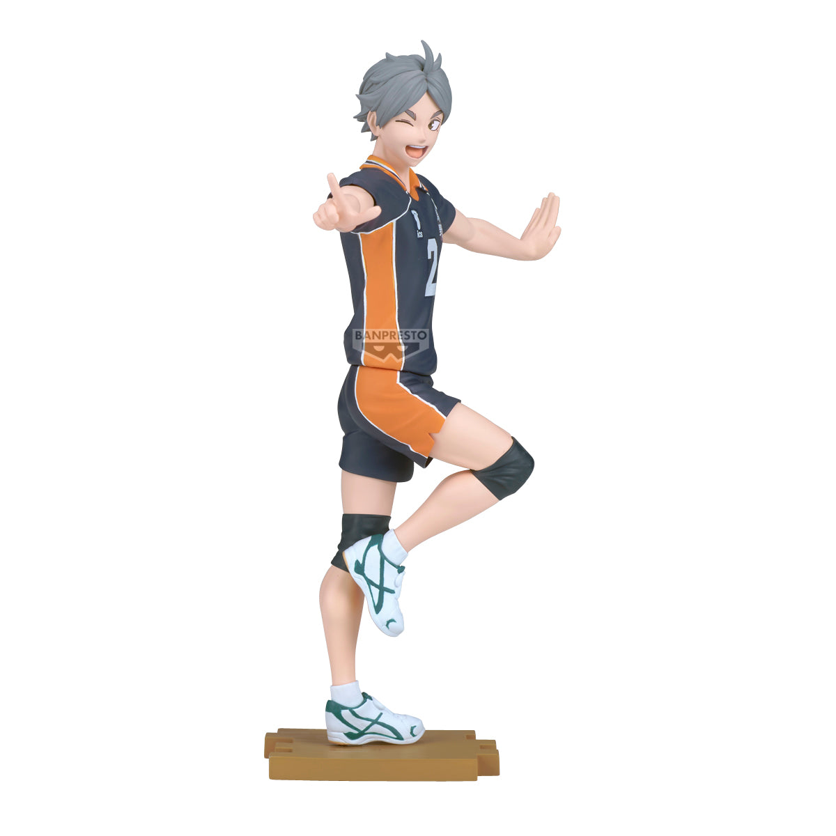 Figurine of an animated character in a sports uniform on a white background