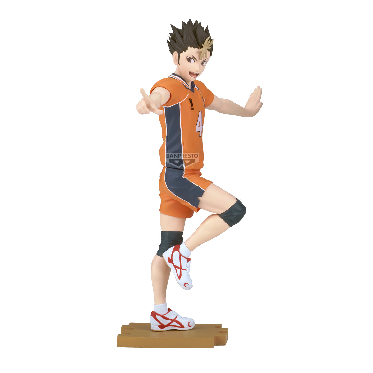 Figurine of an animated character in an orange sports uniform on a white background